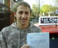 Dobrin with Driving test pass certificate